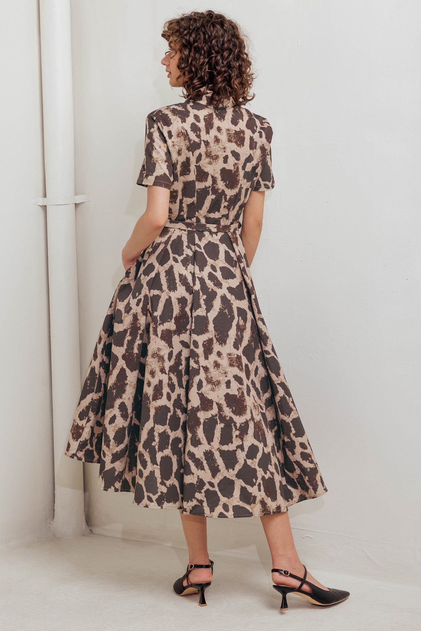 Brown and beige animal print midi dress with shirt collar, belt, and circle skirt for garden parties and special occasions