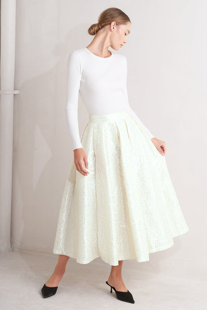 Ivory textured jacquard pleated midi skirt with high waist and box pleats